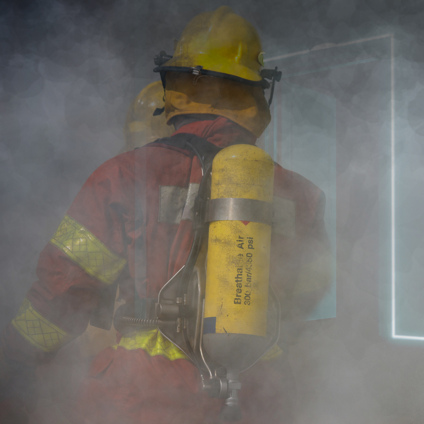 fireman in operation surround with smoke